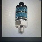 Pressure sensor with snubber and cap
